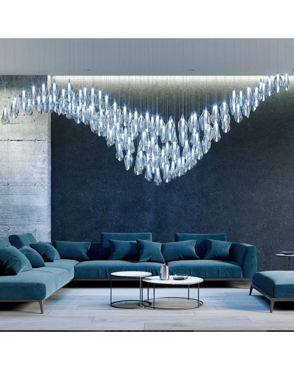 Villa living room with tall glass chandelier