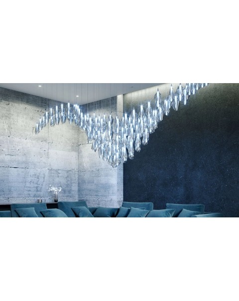 Villa living room with tall glass chandelier