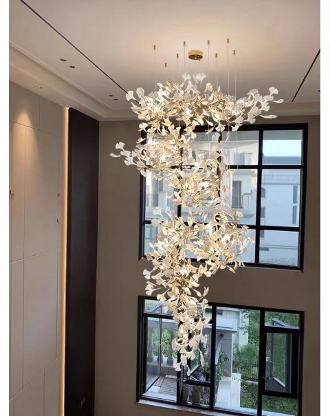 Duplex large chandelier loft staircase light light light luxury villa overhead leaping living room lobby ginkgo leaf light